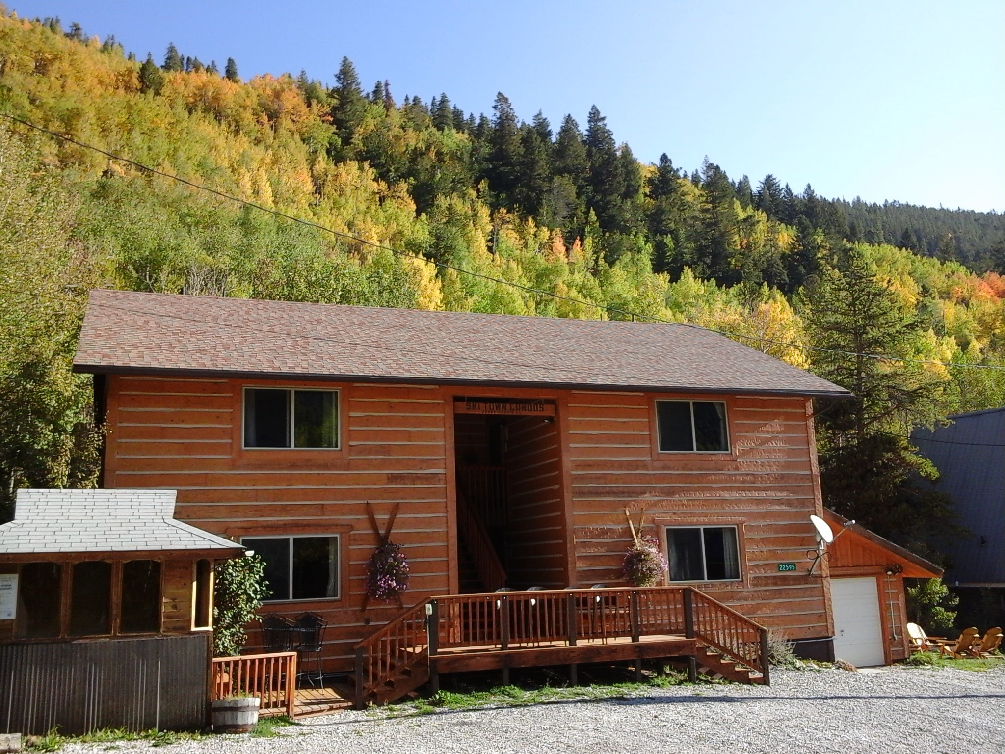 Exterior photos of condos with fall colors on the aspen trees just starting to peak.